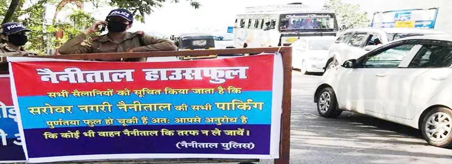 nainital-houseful-banners-greet-tourists.webp