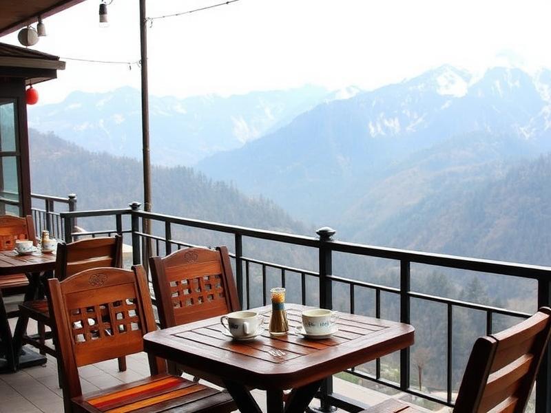 Cozy mountain cafe with outdoor seating overlooking Himalayan peaks