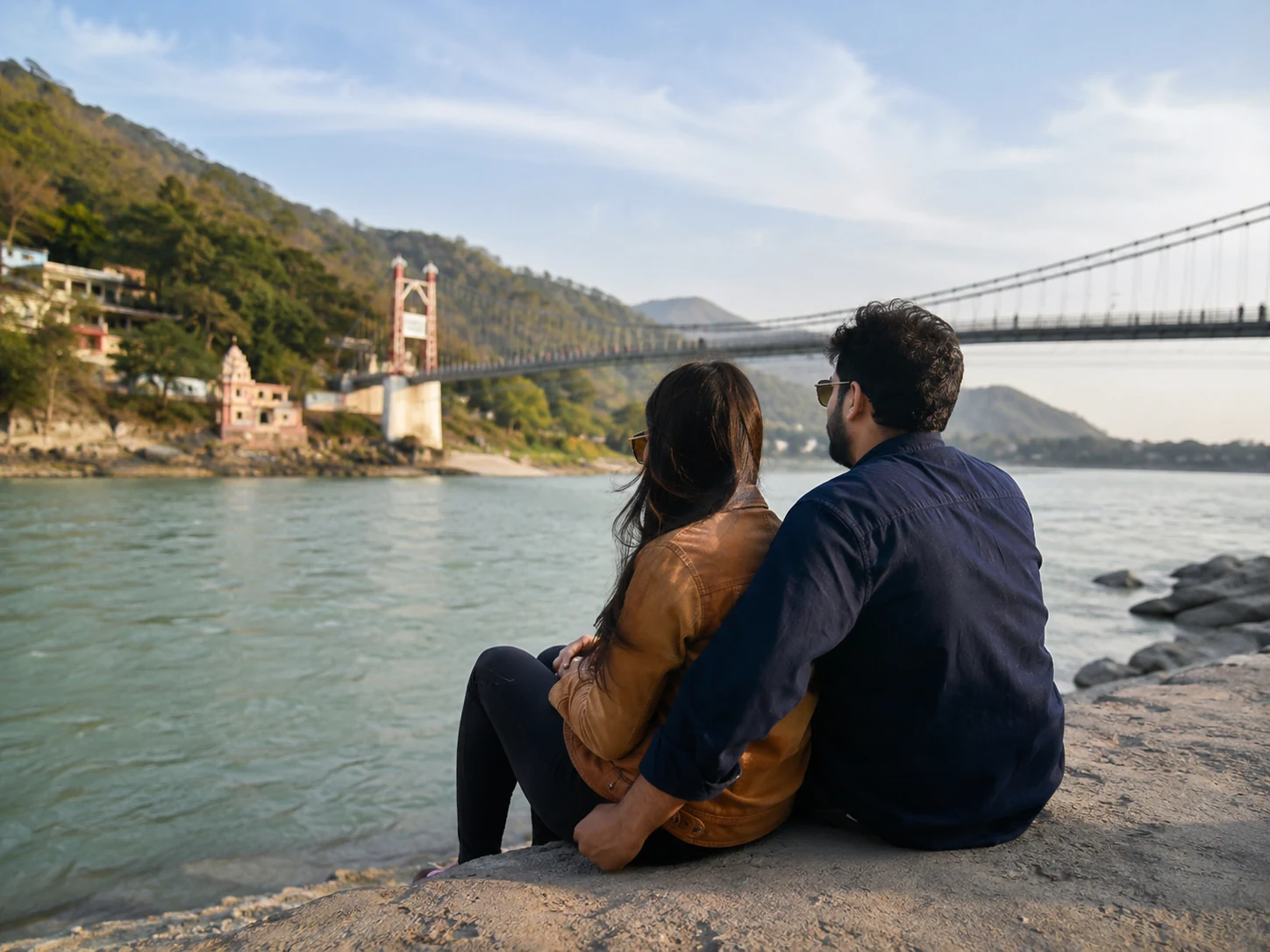 Couple trip in Rishikesh with riverside view